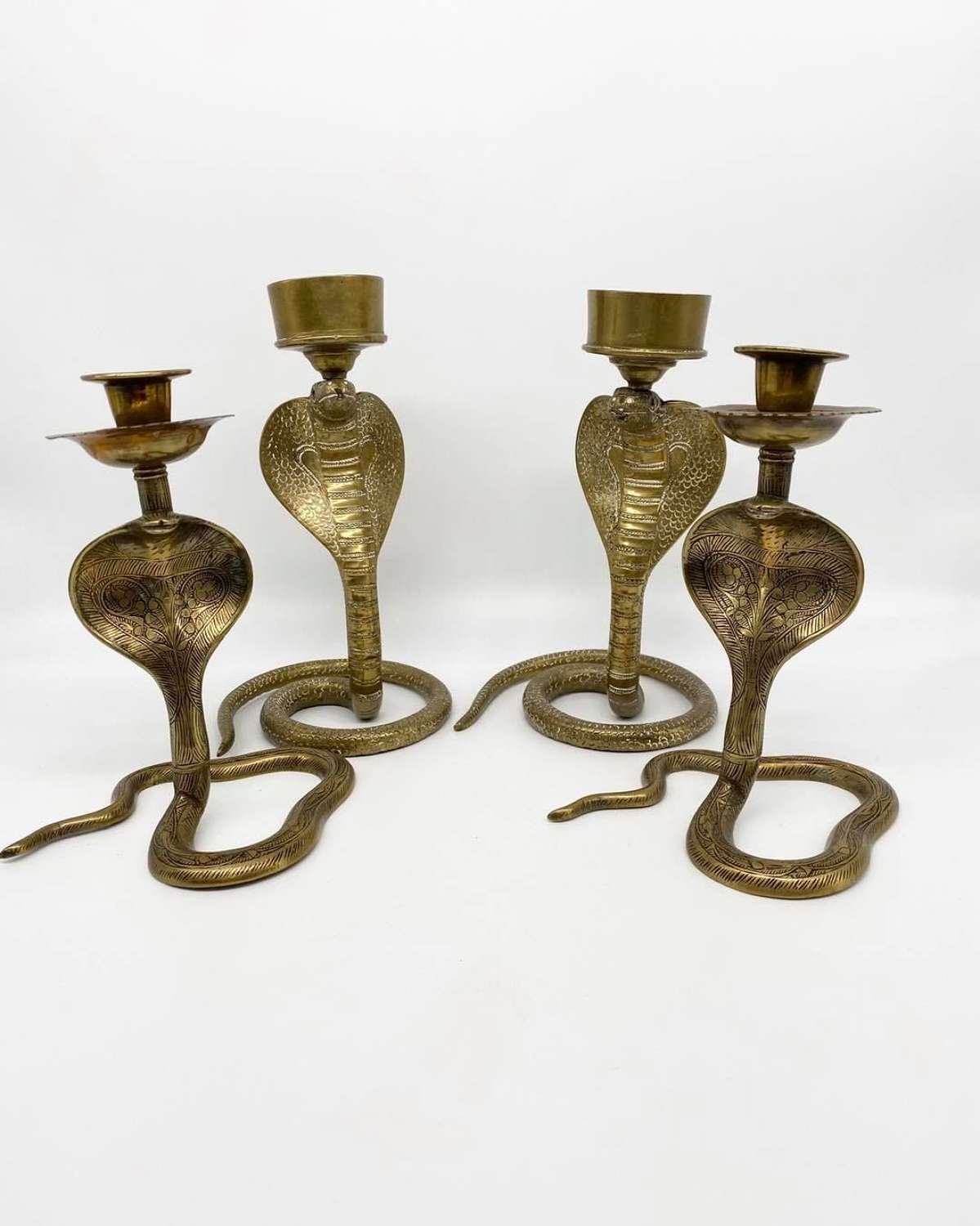 Two Pairs of Serpent Candlestick Holders